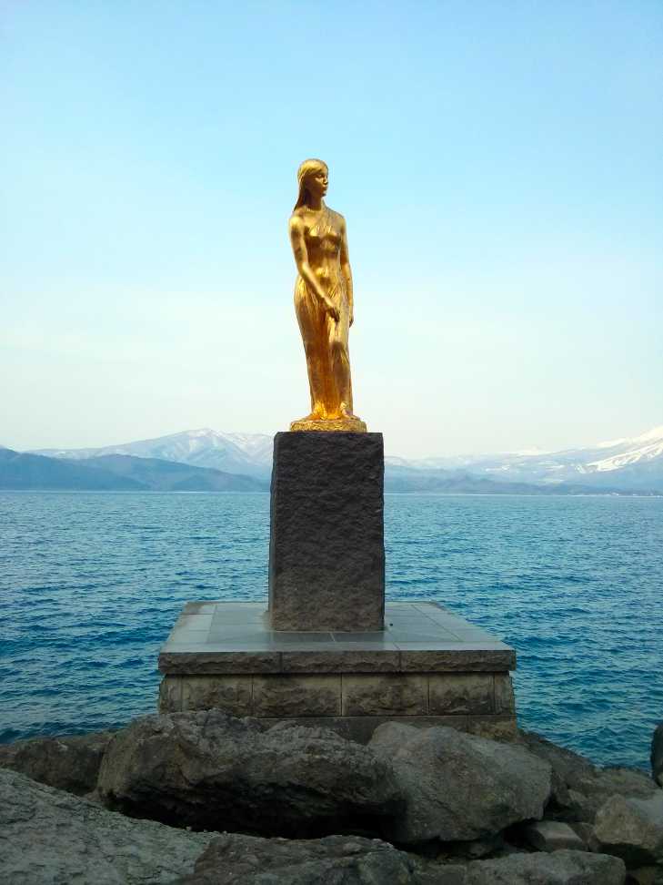 Statue commemorating the legend of Tatsuko on the shores of Lake Tazawa